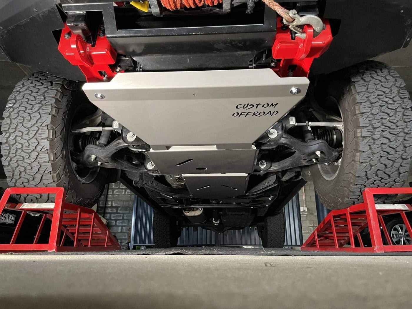 Custom Offroad underbody protection installed on a 4WD